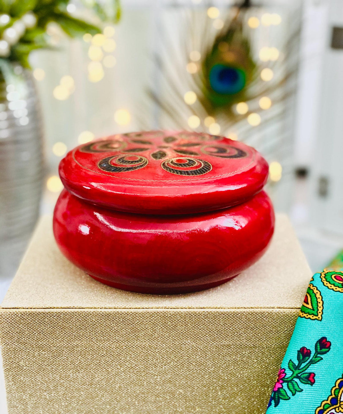 Red wooden box for jewelry and trinkets, round watch box with inlaid lid.