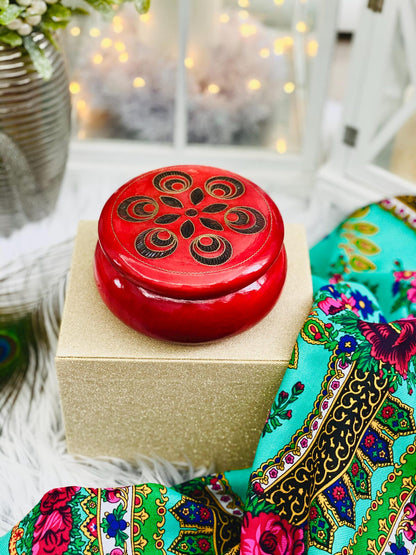 Red wooden box for jewelry and trinkets, round watch box with inlaid lid.