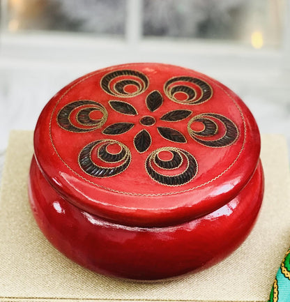 Red wooden box for jewelry and trinkets, round watch box with inlaid lid.