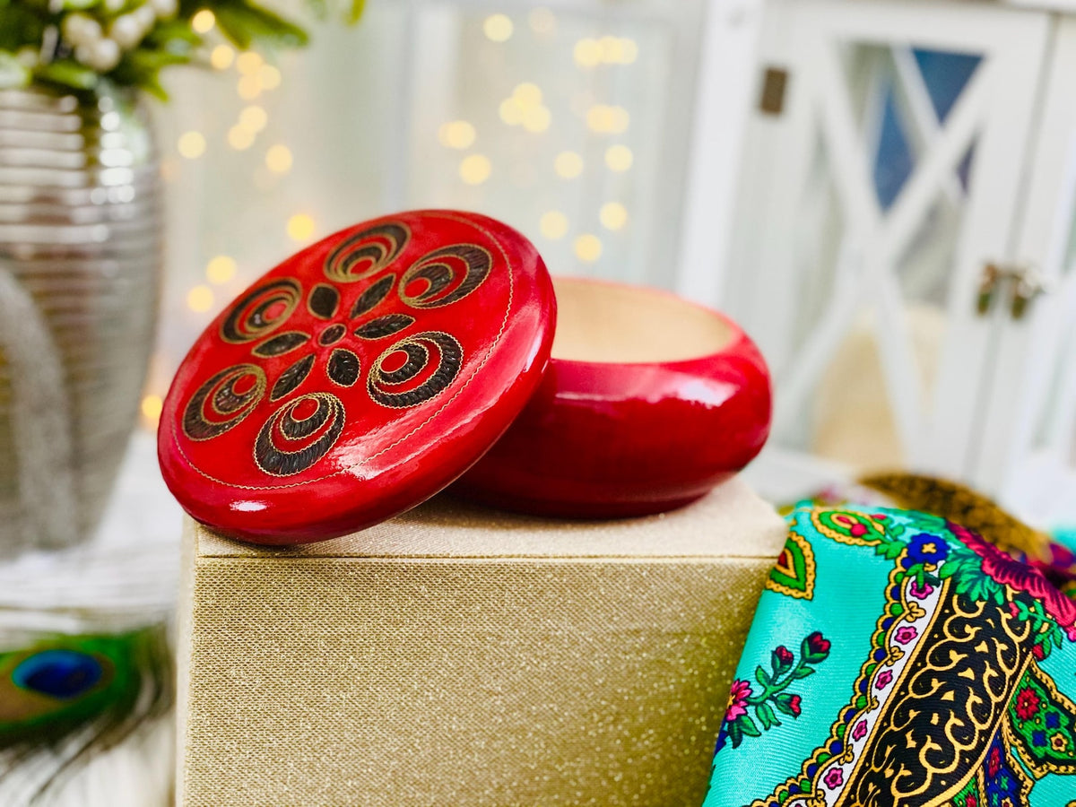 Red wooden box for jewelry and trinkets, round watch box with inlaid lid.