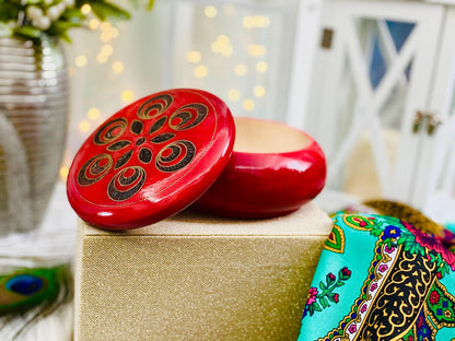 Red wooden box for jewelry and trinkets, round watch box with inlaid lid.